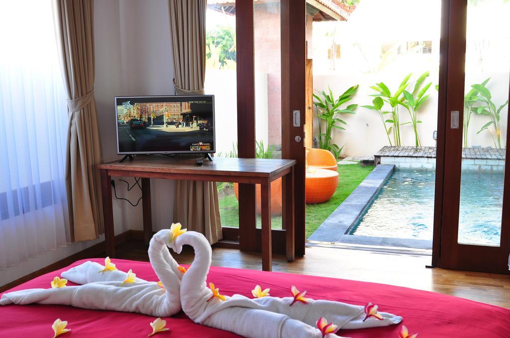 Si Doi Hotel Legian Кута Номер фото