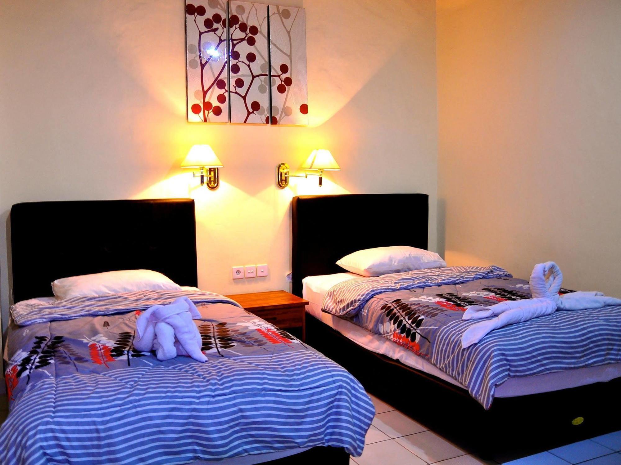 Si Doi Hotel Legian Кута Экстерьер фото